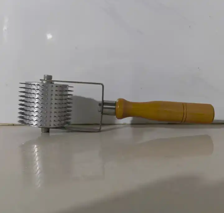 Handheld Punch Roller